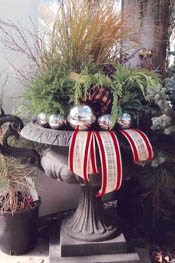 Add silver balls and ribbon